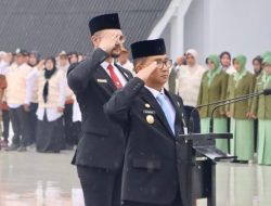 Diguyur Hujan, Pj Gubernur Kaltim Semangat Upacara Peringatan Hari Pahlawan